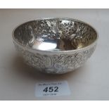 A small Victorian embossed bowl decorated with scrolls and flowers est: £60-£80