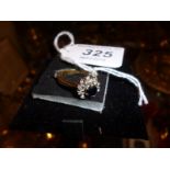 An 18ct gold sapphire and diamond cluster ring (size N) est: £150-£180