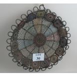 A decorative intricate bead-work dish/wall hanging,