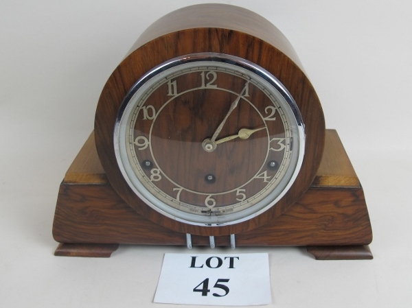 A Garrard Art Deco walnut cased chiming mantel clock, chrome mounts,