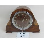 A Garrard Art Deco walnut cased chiming mantel clock, chrome mounts,