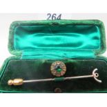 A Victorian emerald and mock diamond pin,