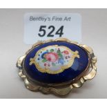 A gold (not marked) and enamel brooch est: £120-£140