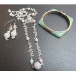 A jade bracelet and a matching necklace and earrings est: £20-£40