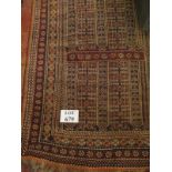 A small Persian rug on brown field (130 x 0.