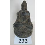 A Chinese bronze statue of a seated Buddha, Ming style probably later,