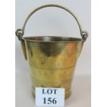 A Georgian brass bucket, with swing handle,