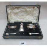 A three piece Mappin & Webb silver condiment set Birmingham 1956 and 1958,