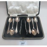 A set of six silver teaspoons and sugar tongs Sheffield 1924 boxed est: £50-£70