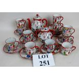 A Japanese export porcelain 26 piece tea set, decorated in the Kutani palette,