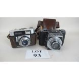 A vintage Reflex-Korelle camera with original leather case and a vintage Zeiss Ikon prontor 125