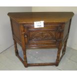 A 20th century oak credence cupboard of small proportions est: £30-£40