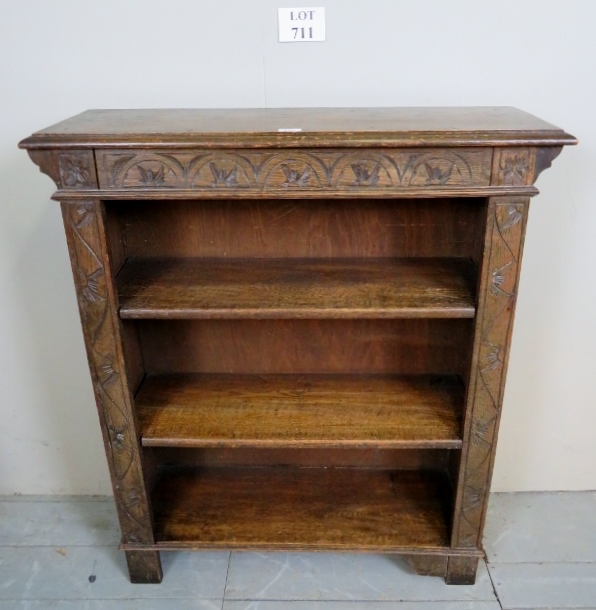 A 19th century carved oak open bookcase with two adjustable shelves est: £40-£60