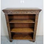 A 19th century carved oak open bookcase with two adjustable shelves est: £40-£60