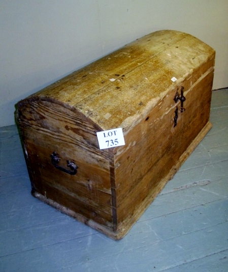 A 19th century pine dome top trunk with iron fittings est: £60-£90