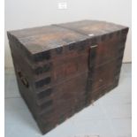 A 19th century oak and iron bound silver chest with iron lock strap and side handles (slightly a/f)