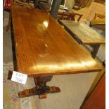 A 20th century refectory dining table with centre stretcher,