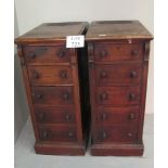 A pair of large Victorian bedside cabinets each with five drawers with turned handles est: