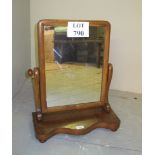 A Victorian mahogany table top toilet mirror with serpentine base and bun feet est: £30-£50