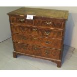 A fine 18th century figured walnut chest of two short over three long drawers with brass handles