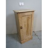 A rustic 19th century pine bedside / pot cupboard with interior shelves est: £20-£40