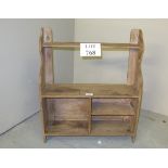 A small pine wall hanging open shelf unit est: £10-£20