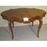 A fine Victorian French walnut centre table with brass ormolu mounts and a blind drawer est: