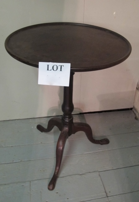 A small Georgian mahogany tilt top tripod table terminating on pad feet est: £130-£160