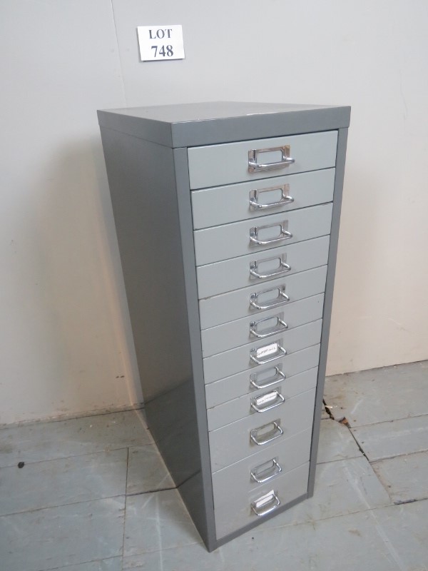 A 20th century metal filing cabinet with nine small and three deep drawers est: £30-£50