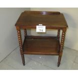 A Victorian rosewood two tier buffet table with turned legs est: £40-£60