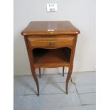 A small 20th century oak bedside table with a single drawer over an open cupboard est: £30-£50