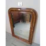 An unusual pitch pine framed wall mirror with painted grain design est: £30-£50