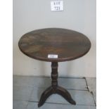 A small 19th century oak tripod wine table (a/f) est: £30-£50