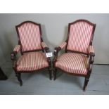 A pair of 19th century mahogany carved armchairs upholstered in stripe material est: £300-£500