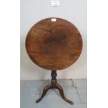 A fine Georgian oak tilt top tripod wine table with turned column over pad feet est: £50-£80