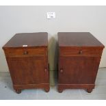 A pair of 19th century mahogany bedside cabinets with single drawer to top over cupboard doors and