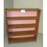 A 19th century pine open bookcase with shelves est: £30-£50