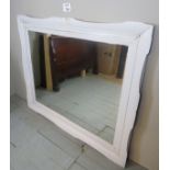 A very large white painted pine framed wall mirror (133 x 163cm approx) (slightly a/f) est: £40-£60