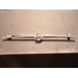 Diamond bar brooch est: £160-£200