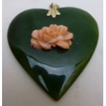 A jade and coral heart pendant, 5cm diam