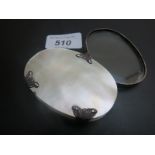 A silver mounted on shell magnifying gla