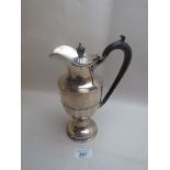 A classical shaped silver hot water jug