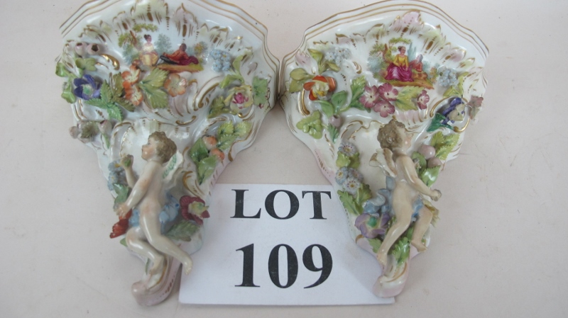 Pair of early C20th Dresden cherub and e