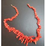 A graduated coral necklace est: £40-£60