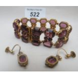 A bracelet and earring set est: £120-£14