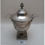 A two handled silver trophy & cover embo