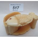 A carved bone trinket box 5.5cm long est