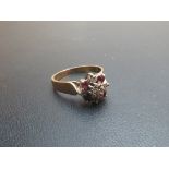 A 9ct gold ruby and diamond ring (size L