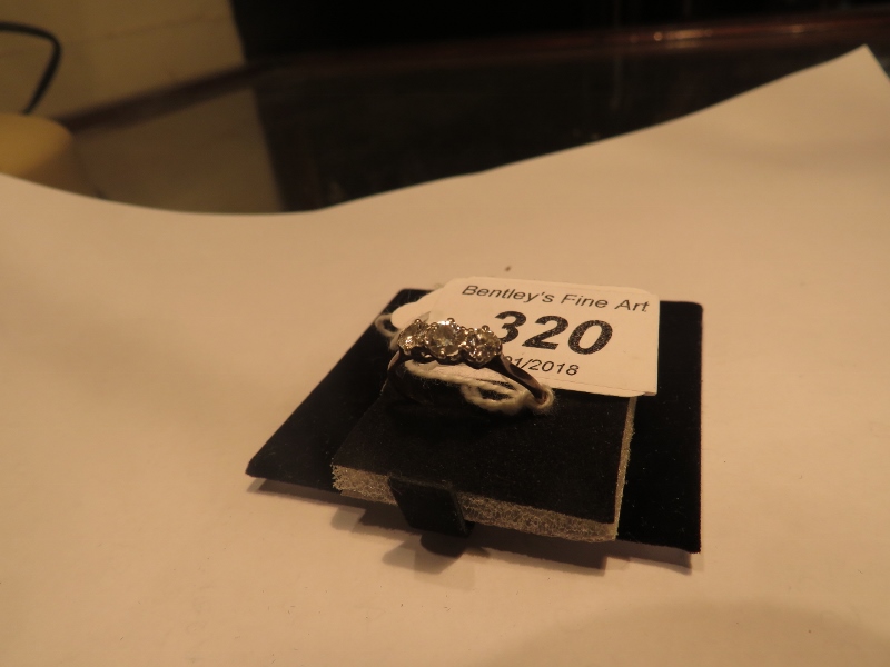 A three stone diamond set ring (size M) - Image 2 of 2