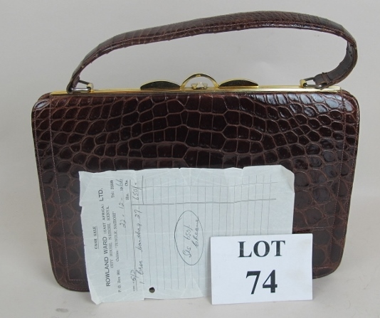 A vintage crocodile skin ladies handbag,